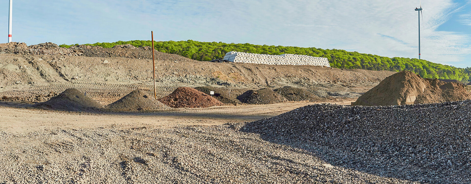 Landfill construction materials from mineral waste